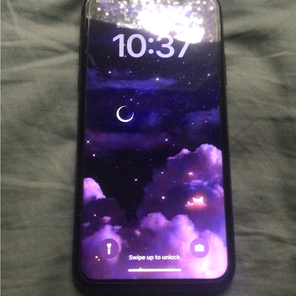Apple Smartphone with Black and Purple Display